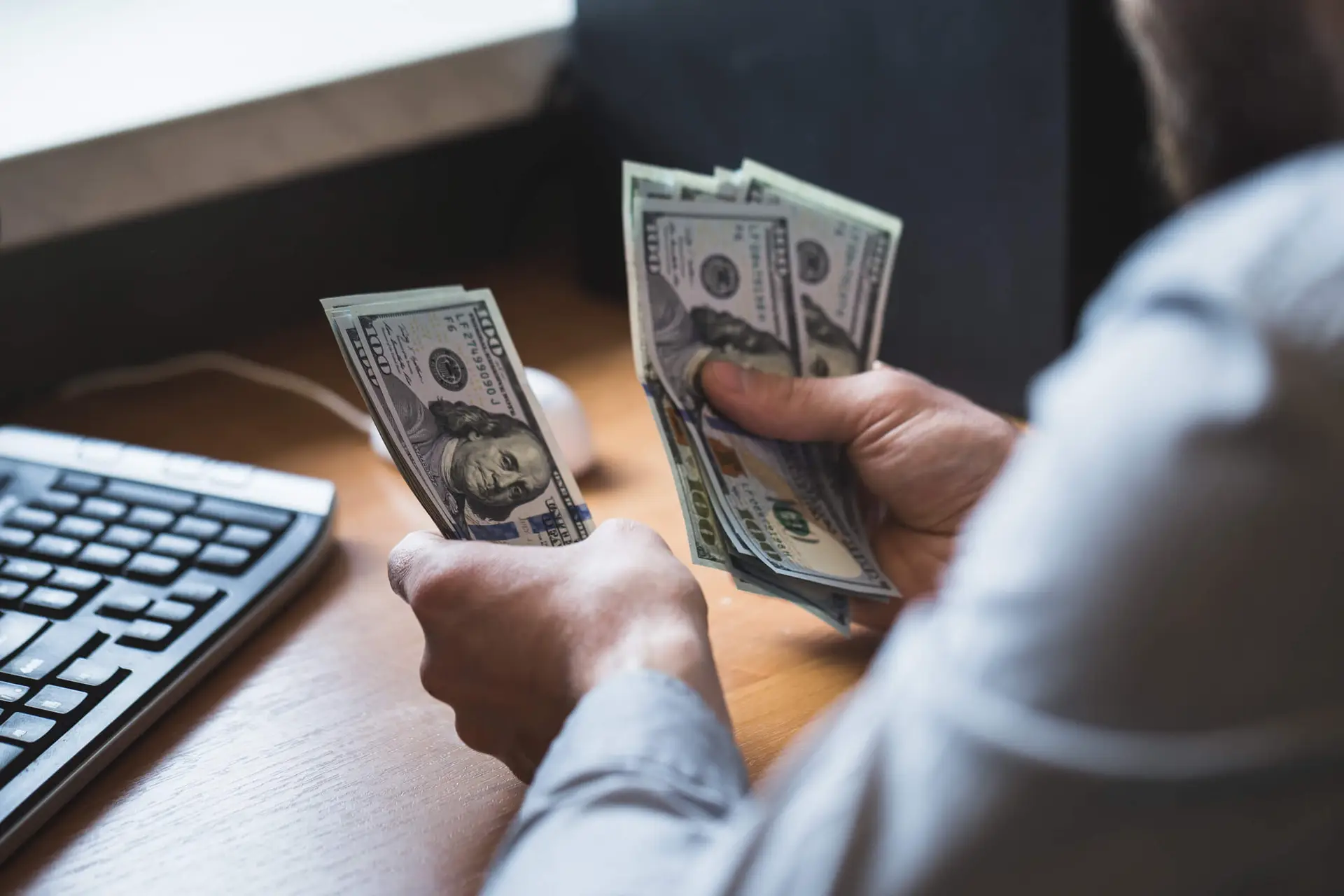 businessman-is-counting-dollars-banknotes-PCFS7CHJPG.jpg businessman-is-counting-dollars-banknotes-PCFS7CHJPG.jpg